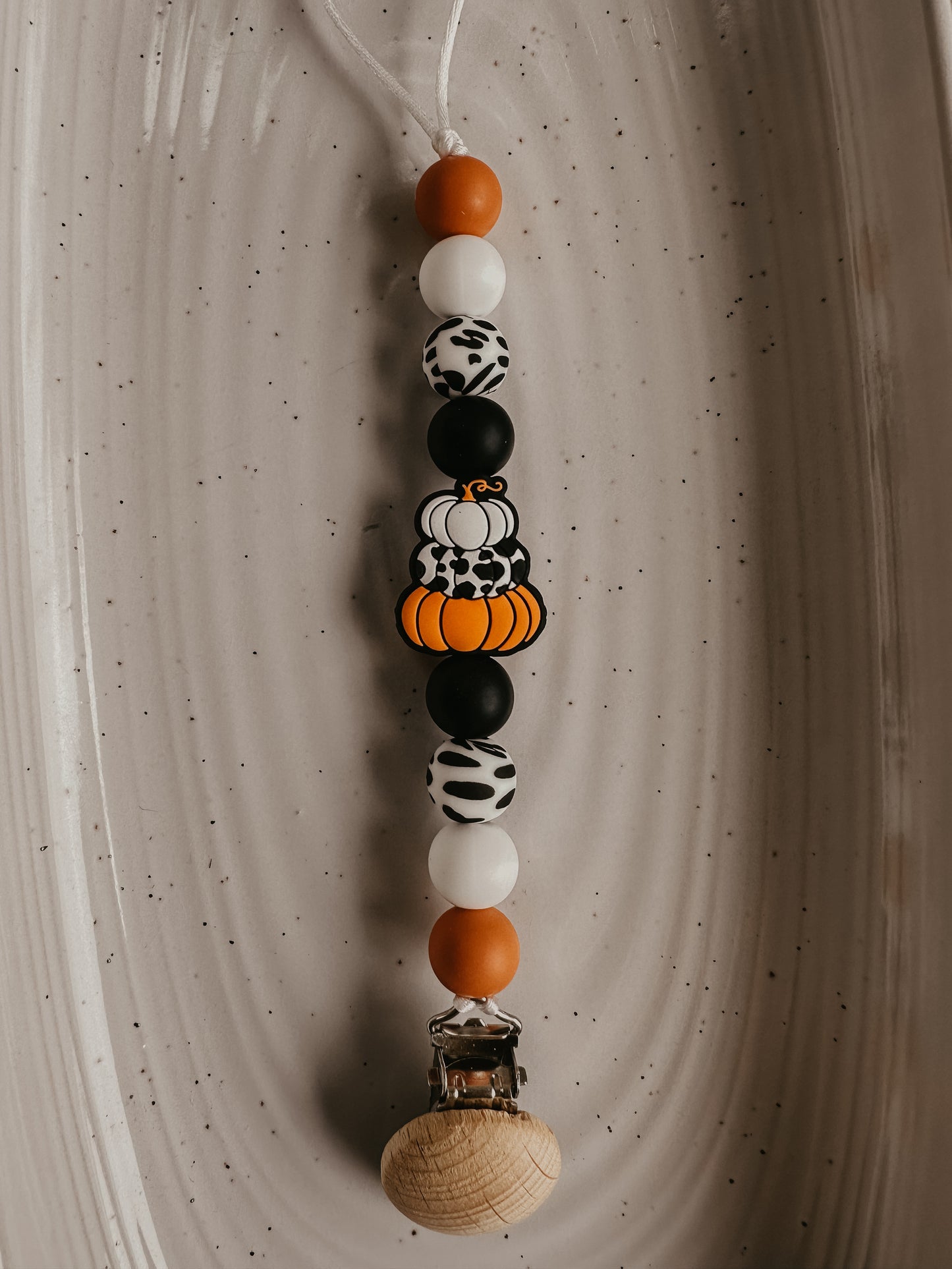 Cowprint Pumpkin Pacifier Clip