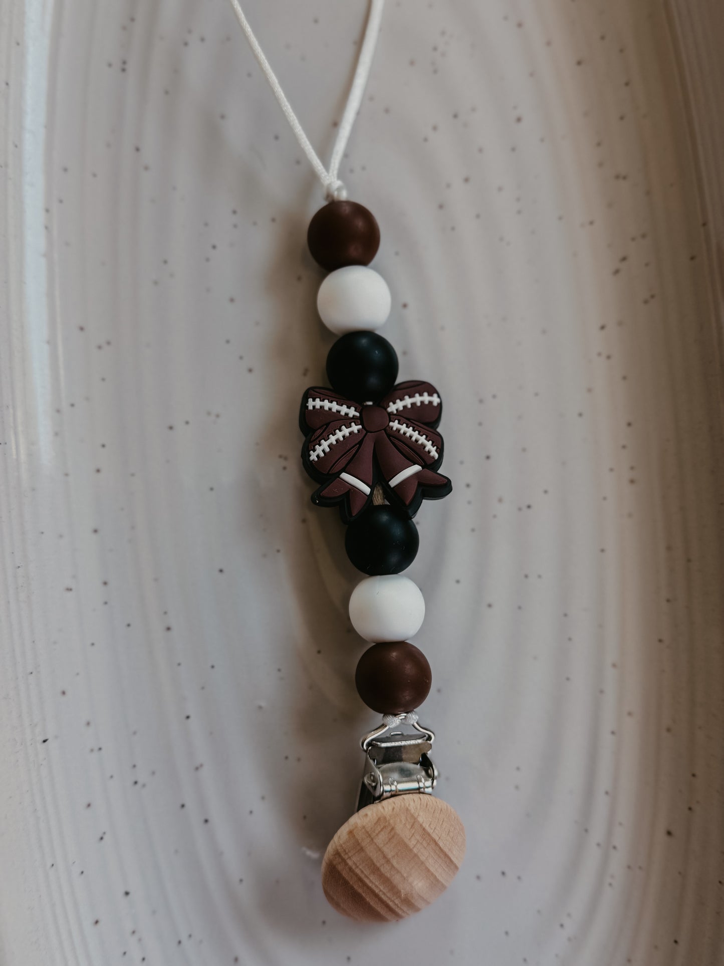 Football Bow Pacifier Clip